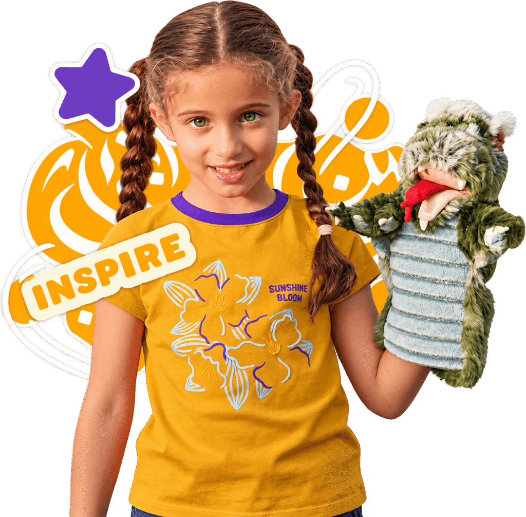 Young girl in a yellow Maya's Stories T-shirt holding a dragon puppet, with a purple star and an 'Inspire' badge behind her